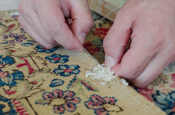Expert rug repair - hand stitching fringe